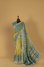 Load image into Gallery viewer, Blue &amp; green ombrae banarasi bandhej with border highlighted  paired with unstitched blouse
