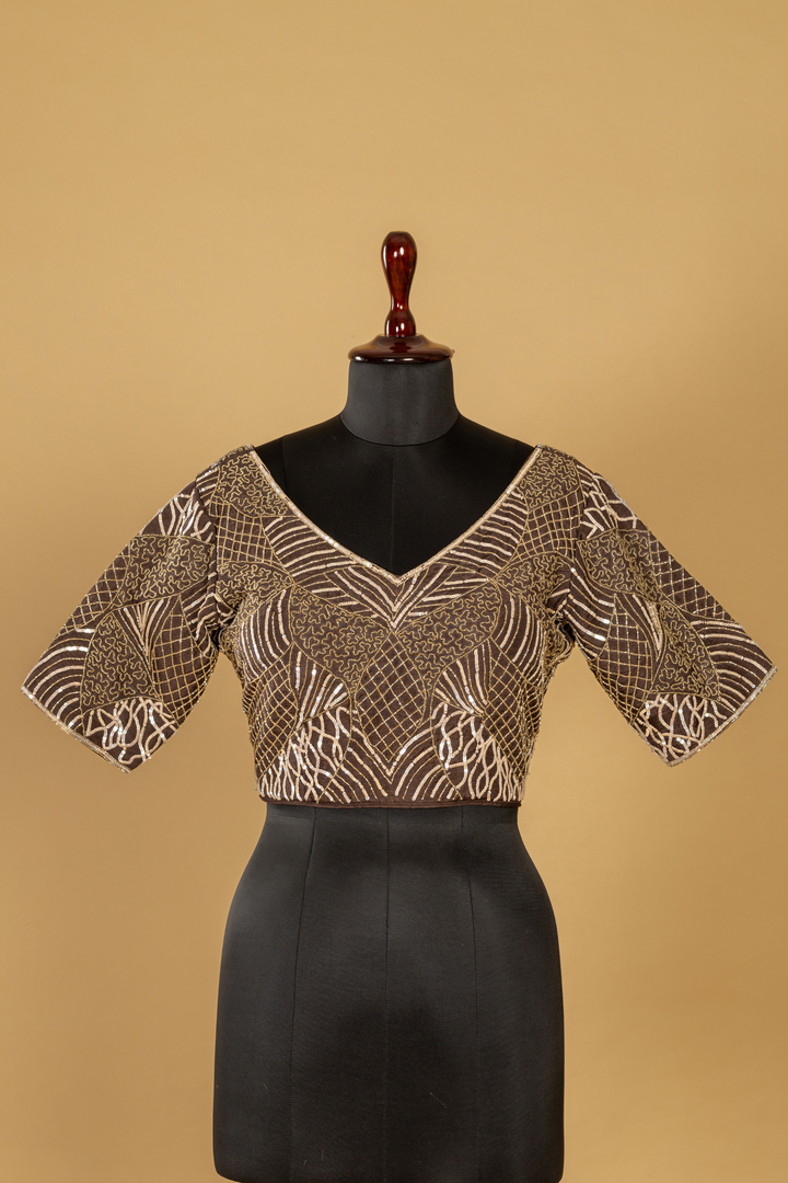Brown Tissue Organza Saree paired with Stitched Embroidered Blouse