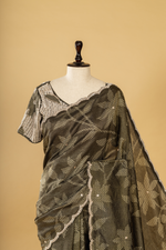Load image into Gallery viewer, Carbon green bandhej tissue scallop border saree paired with heavy blouse
