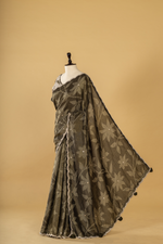 Load image into Gallery viewer, Carbon green bandhej tissue scallop border saree paired with heavy blouse
