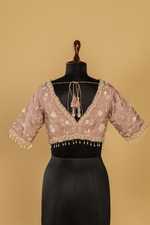 Load image into Gallery viewer, Chickoo Tissue sequence embroidered saree paired with elbow sleeves blouse
