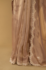 Load image into Gallery viewer, Chickoo Tissue sequence embroidered saree paired with elbow sleeves blouse
