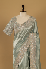 Load image into Gallery viewer, Greyish Blue Zari tissue sequence saree paired with stitched blouse
