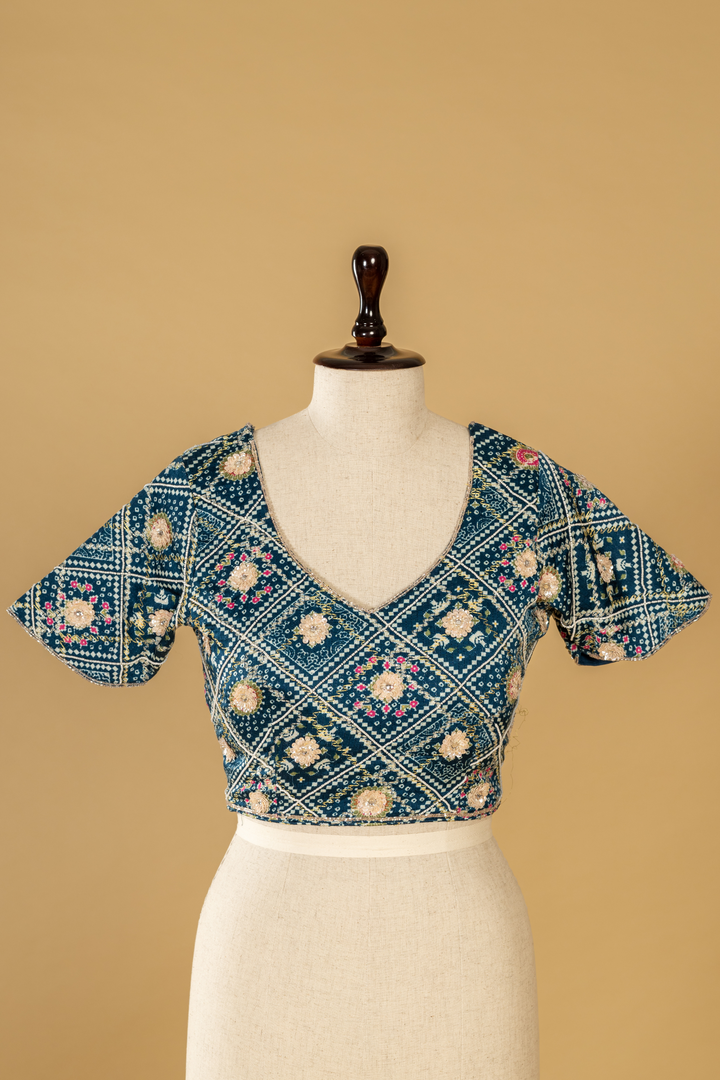 Ice Blue Abudai silk paired with bamdhani contrast blouse
