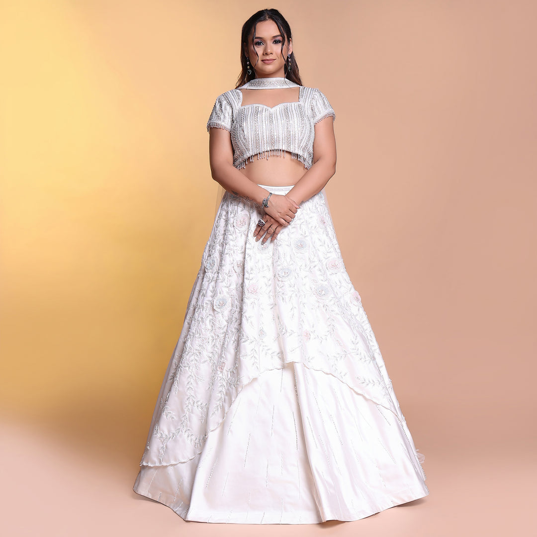 White layered lehenga with choker dupatta