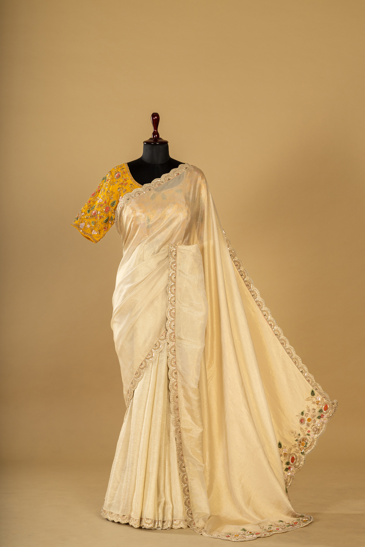 Ivory crush tissue resham & zardosi embroidered saree paired with  yellow blouse