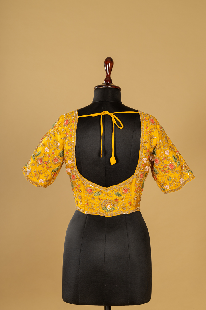 Ivory crush tissue resham & zardosi embroidered saree paired with  yellow blouse