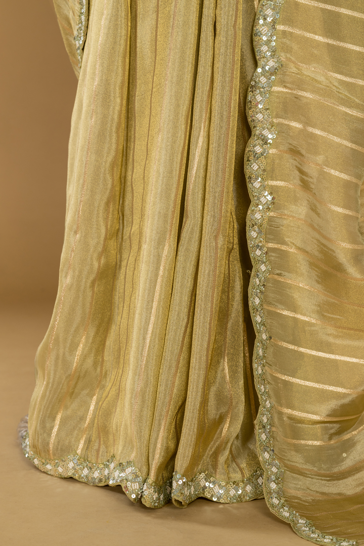 Lemon Yellow Tissue sequence embroidered saree paired with stitched blouse