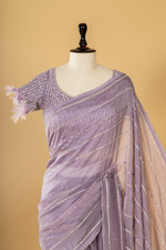 Load image into Gallery viewer, Lilac Tissue embroidered saree paired with feather detailing blouse
