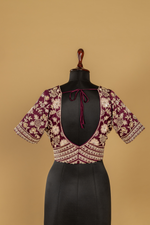 Load image into Gallery viewer, Mauve Crushed Tissue heavy embroidered saree paired with purple blouse
