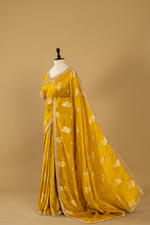Load image into Gallery viewer, Mustard silk printed border highlighted saree paired with elbow sleeves blouse
