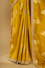 Load image into Gallery viewer, Mustard silk printed border highlighted saree paired with elbow sleeves blouse
