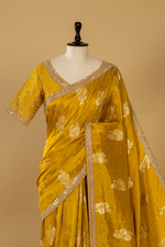 Load image into Gallery viewer, Mustard silk printed border highlighted saree paired with elbow sleeves blouse
