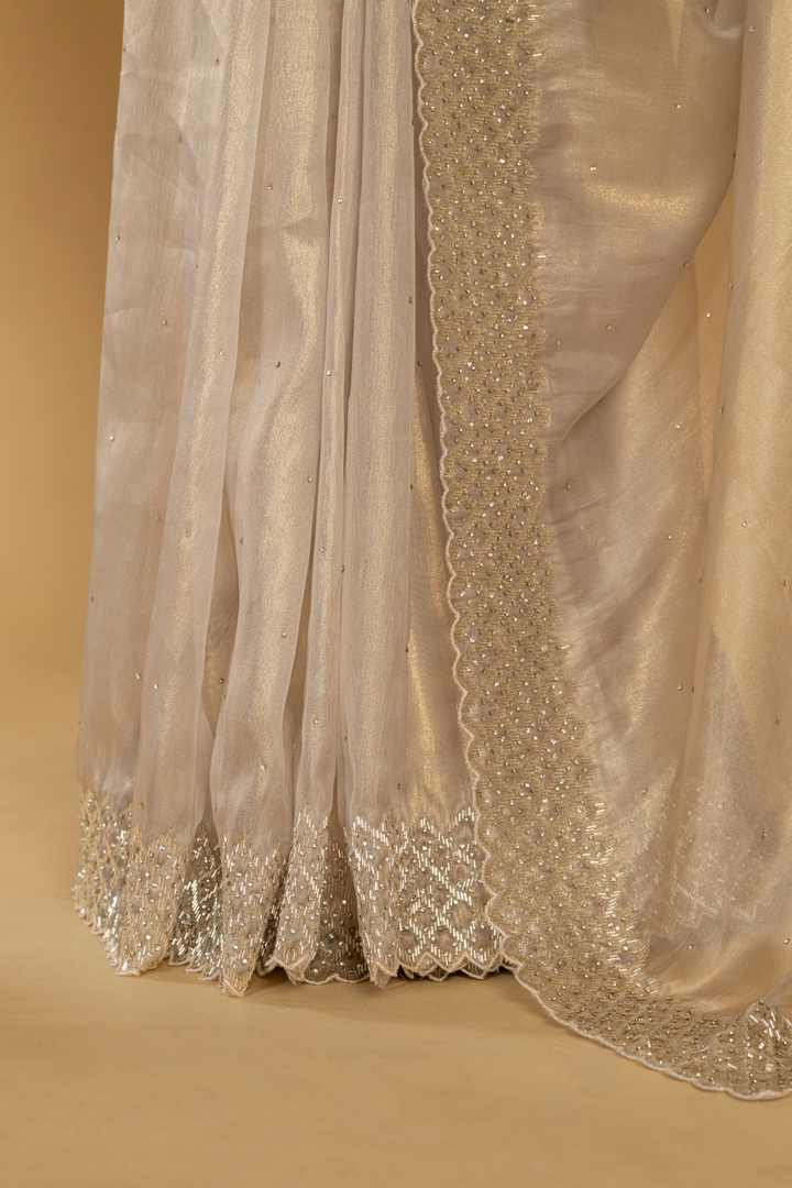 Peach soft Tissue katdana & stone work paired with stitched blouse