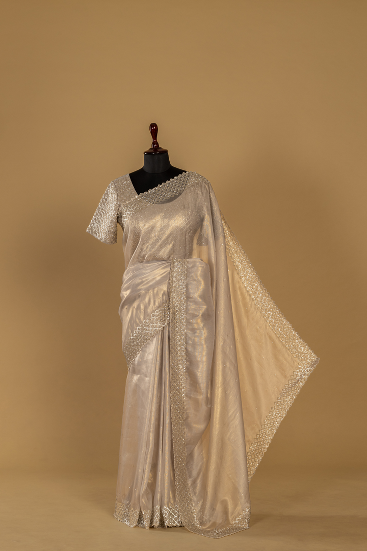 Peach soft Tissue katdana & stone work paired with stitched blouse