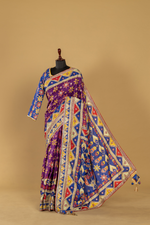 Load image into Gallery viewer, Purple printed saree with gota work highlightment paired with full sleeves contrast blouse
