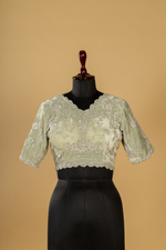 Load image into Gallery viewer, Sea green Abudai silk with light embroidery paired with heavy velvet blouse
