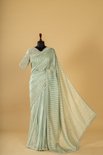Load image into Gallery viewer, Sea green Abudai silk with light embroidery paired with heavy velvet blouse
