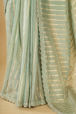 Load image into Gallery viewer, Sea green Abudai silk with light embroidery paired with heavy velvet blouse
