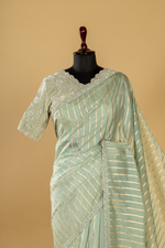 Load image into Gallery viewer, Sea green Abudai silk with light embroidery paired with heavy velvet blouse
