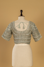 Load image into Gallery viewer, Sea green tissue sequence embroidery saree paired with embroidered stitched blouse
