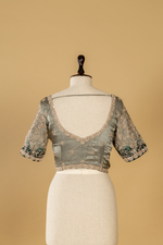 Load image into Gallery viewer, Steel grey georgette tissue saree paired with border ombrae embroidery blouse
