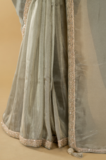 Load image into Gallery viewer, Steel grey georgette tissue saree paired with border ombrae embroidery blouse
