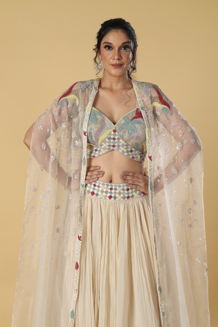 Ivory organza sequence multicolour embroidered blouse and cape paired with pleated chiffon organza skirt