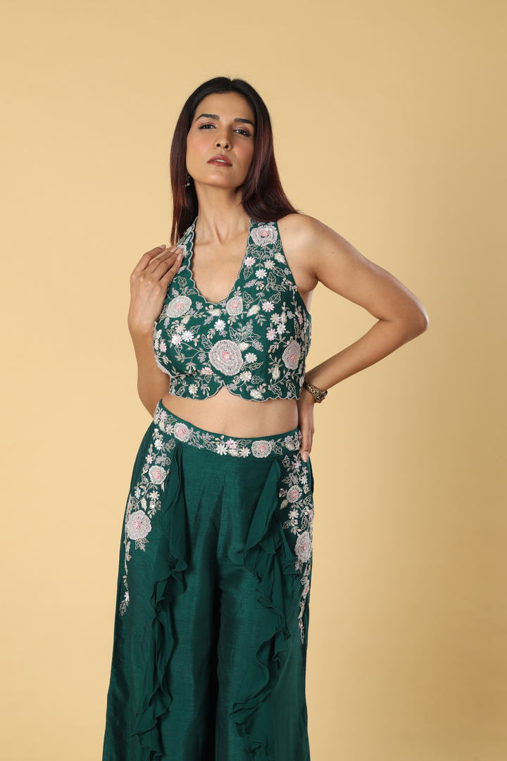 Green D-dupion georgette ruffle palazzo paired with embroidered halter neck blouse