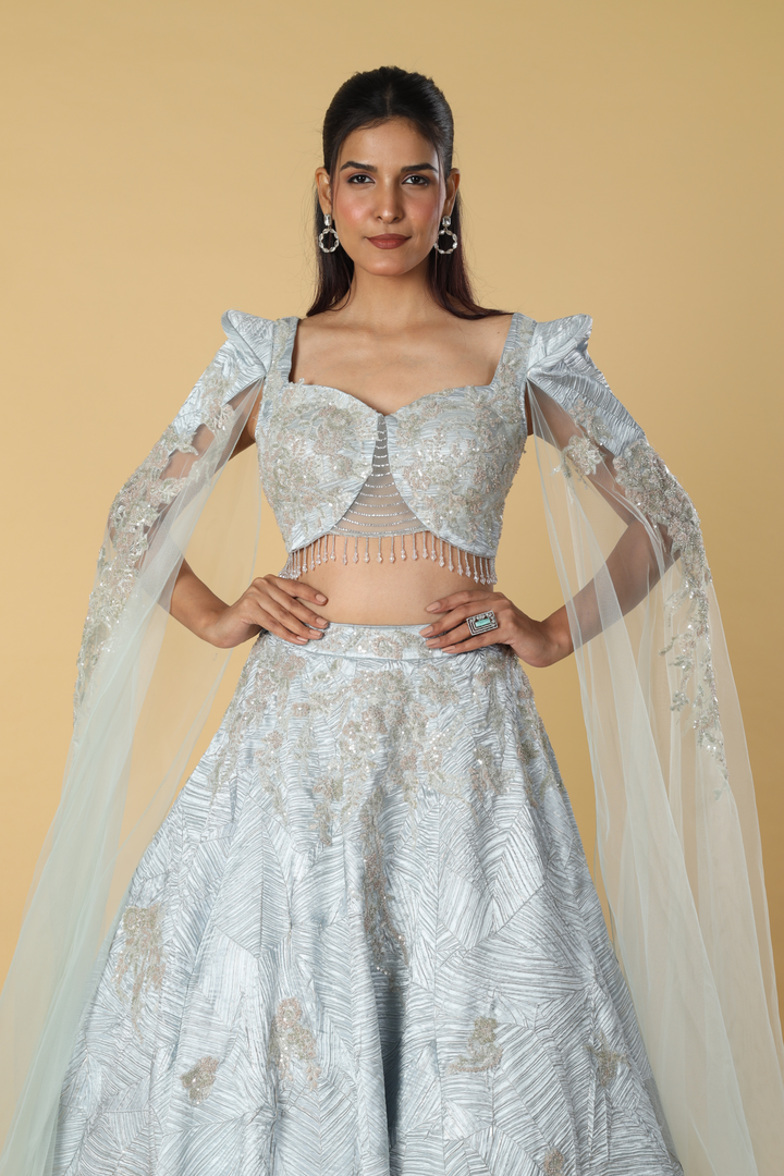 Powder blue textured fabric with patch work designer blouse & skirt