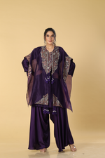 Load image into Gallery viewer, Purple resham dori embroidered suit paired with modal satin dhoti style bottam and organza cape
