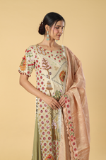 Load image into Gallery viewer, Ombrae green beige story telling resham dori embroidery suit paired with banarasi georgette and contrast peach banarasi dupatta
