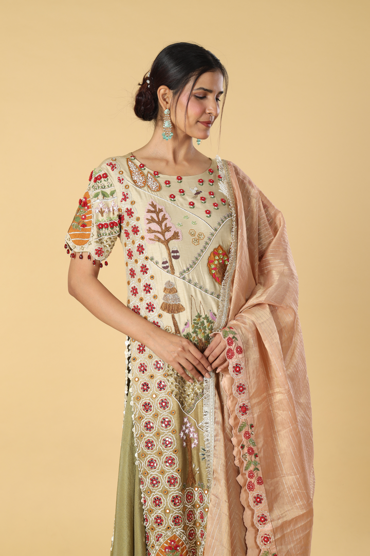 Ombrae green beige story telling resham dori embroidery suit paired with banarasi georgette and contrast peach banarasi dupatta