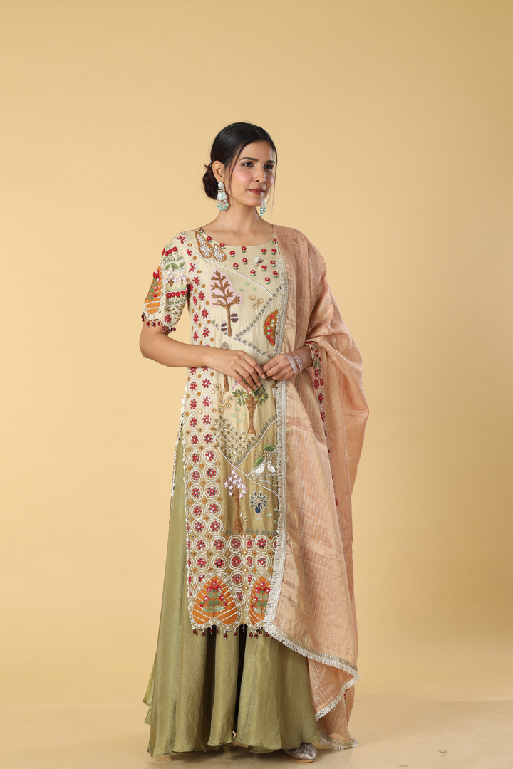 Ombrae green beige story telling resham dori embroidery suit paired with banarasi georgette and contrast peach banarasi dupatta