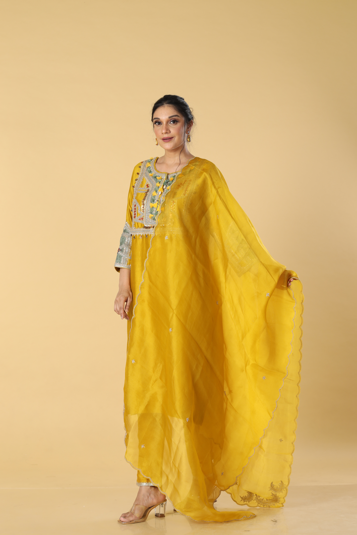 Yellow chandari dori embroidered suit paired with pants & banarasi organza dupatta