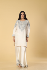 Load image into Gallery viewer, Off white banarasi organza mirror &amp; resham embroidered suit paired with cowl skirt
