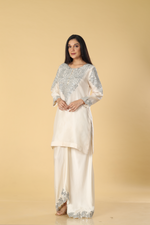 Load image into Gallery viewer, Off white banarasi organza mirror &amp; resham embroidered suit paired with cowl skirt
