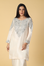 Load image into Gallery viewer, Off white banarasi organza mirror &amp; resham embroidered suit paired with cowl skirt
