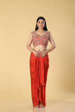 Load image into Gallery viewer, Burnt orange modal satin tulip skirt paired with embroidered blouse and organza cape
