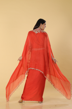 Load image into Gallery viewer, Burnt orange modal satin tulip skirt paired with embroidered blouse and organza cape
