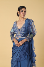 Load image into Gallery viewer, Blue raw silk multicolour resham embroidered blouse paired with chinnon drape &amp; crepe skirt
