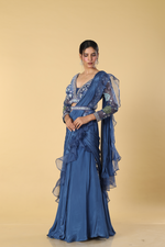 Load image into Gallery viewer, Blue raw silk multicolour resham embroidered blouse paired with chinnon drape &amp; crepe skirt

