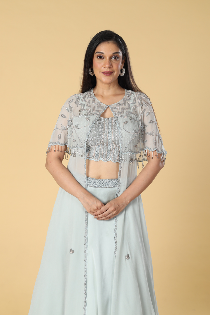 Grey georgette pearl embroidered cape paired with satin organza and corset blouse