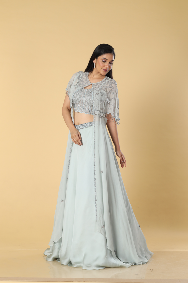 Grey georgette pearl embroidered cape paired with satin organza and corset blouse