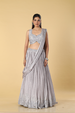 Load image into Gallery viewer, Dusty grey pleated embroidered skirt paired with drape and blouse
