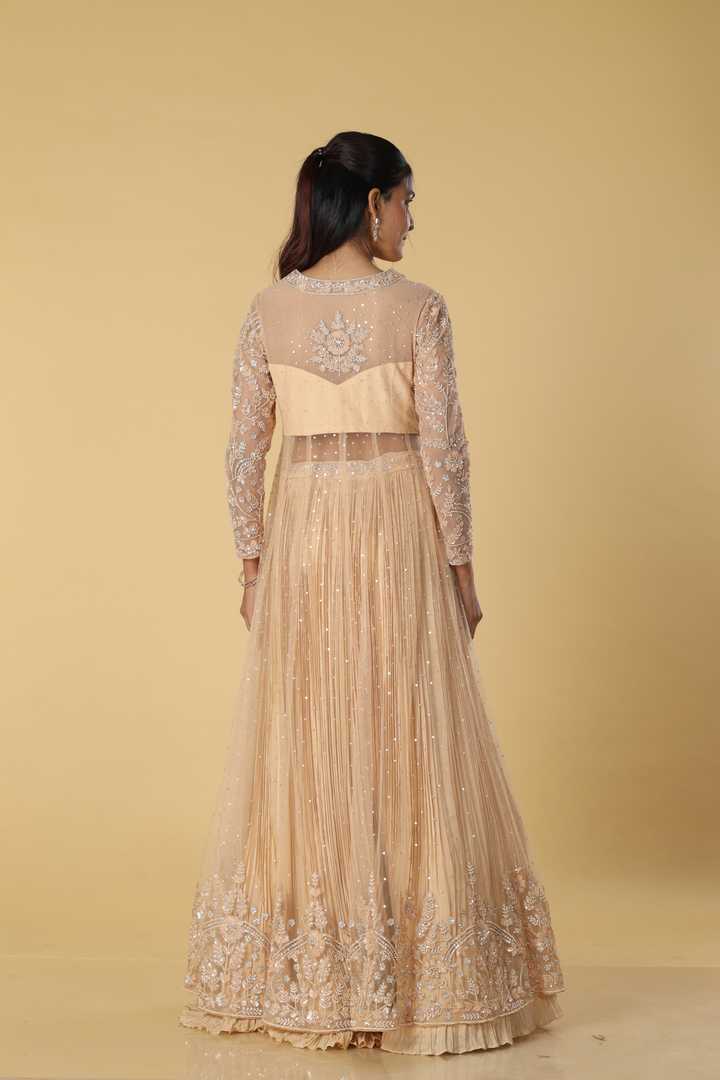 Beige net heavily embroidered indowestern paired with pleated satin organza skirt