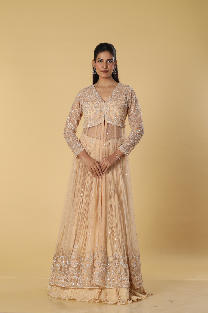 Beige net heavily embroidered indowestern paired with pleated satin organza skirt