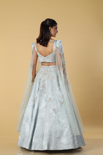 Load image into Gallery viewer, Powder blue textured fabric with patch work designer blouse &amp; skirt

