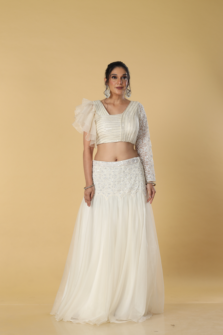 Off white organza skirt with sequence waist embroidered paired with wiring blouse ruffle sleeves