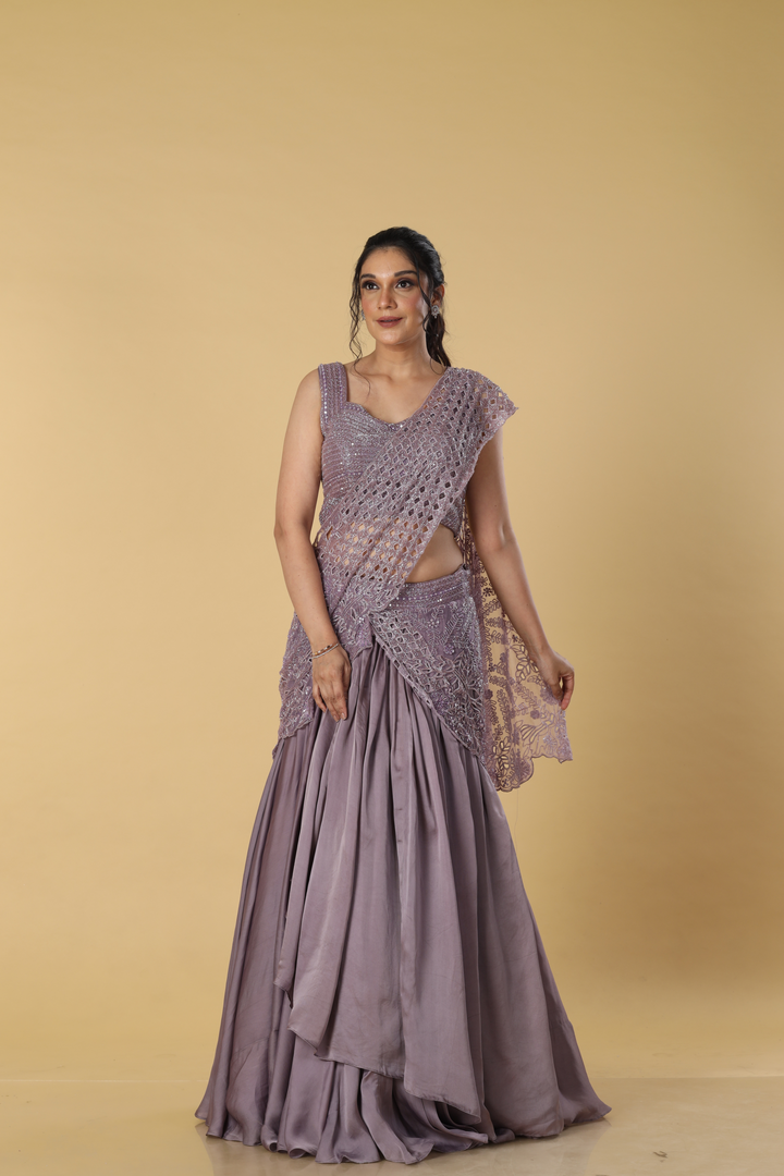 Purple organza cut work embroidered blouse & drape paired with satin organza layered skirt